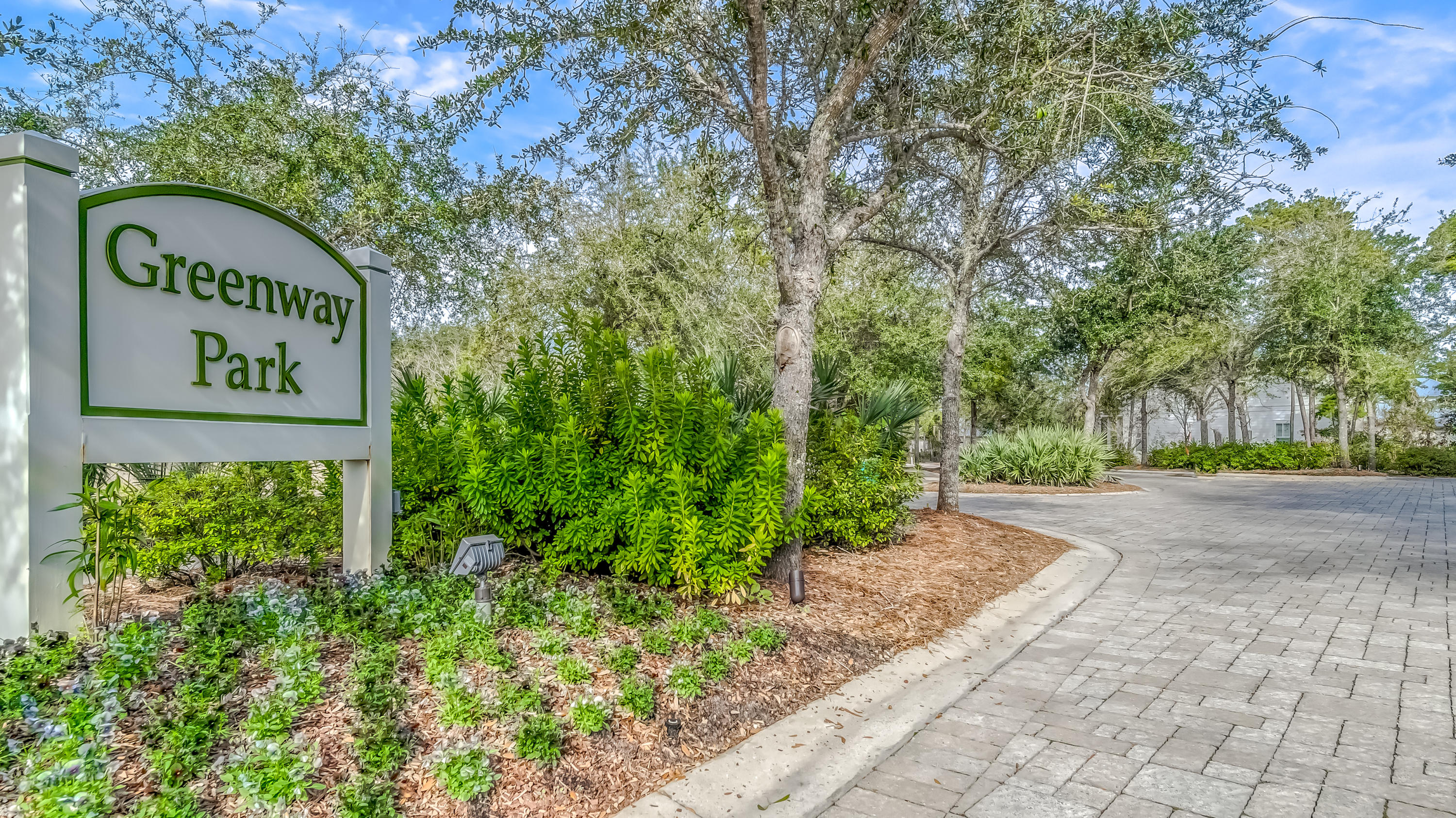 27 Dune Ridge Road Santa Rosa Beach, FL 32459 - Photo 2 of 6 a sign that is sitting in front of flowers