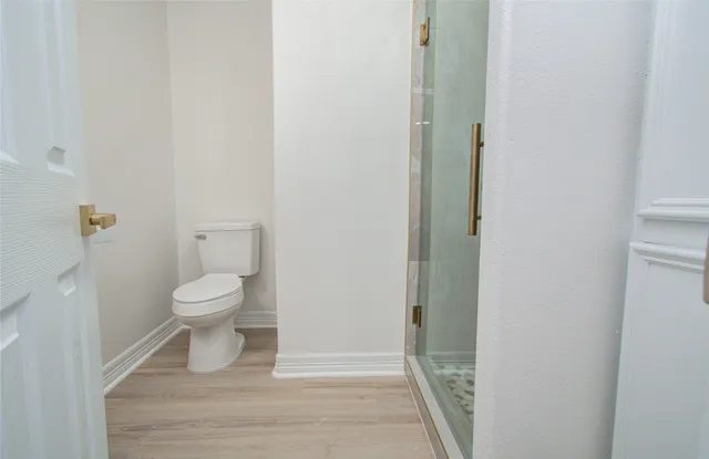 a view of a house with garden and pathway