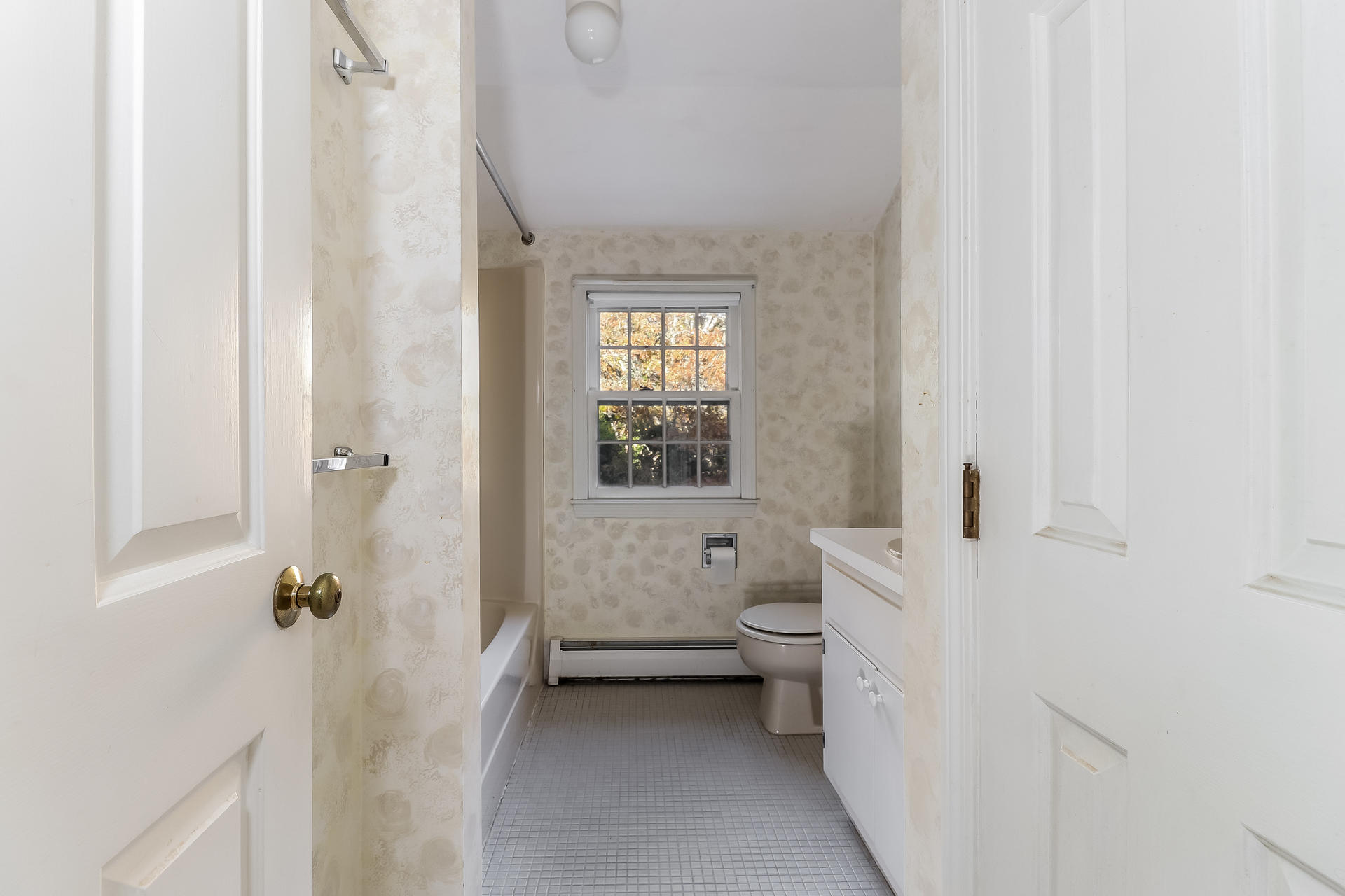 22 Joyce Anne Road Centerville, MA 02632 - Photo 18 of 18 a bathroom with a granite countertop toilet a sink and a mirror
