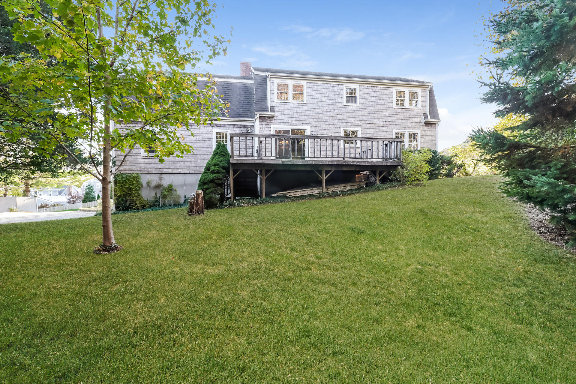 22 Joyce Anne Road Centerville, MA 02632 - Photo 3 of 18 a view of a house with a yard and sitting area
