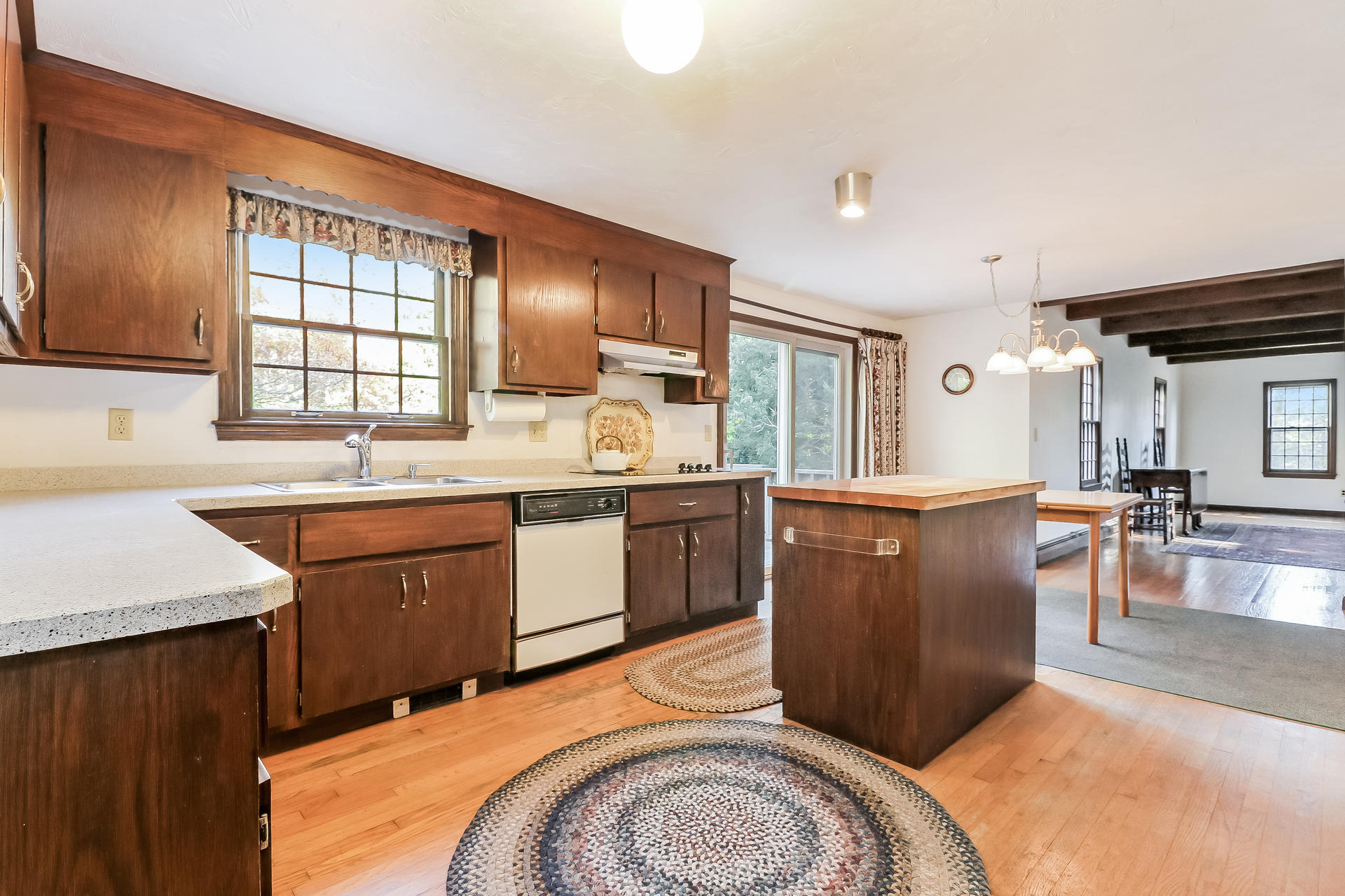 22 Joyce Anne Road Centerville, MA 02632 - Photo 8 of 18 a kitchen with sink a washer and dryer