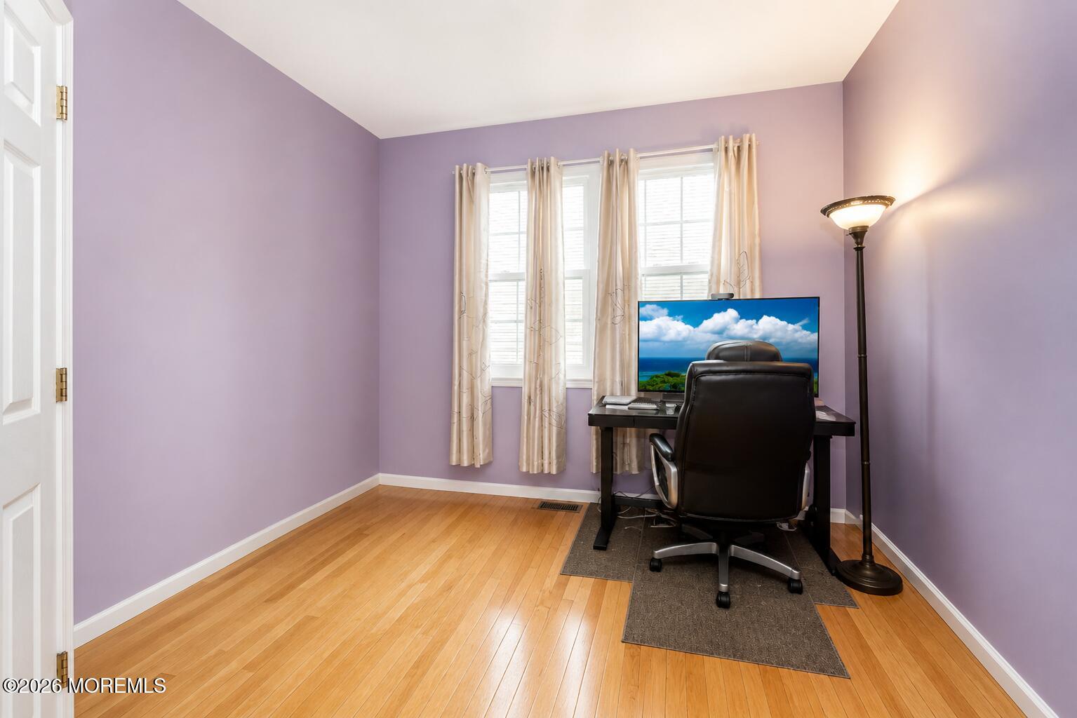 315 Wedgewood Road Morganville, NJ 07751 - Photo 17 of 37 a view of a workspace with furniture and a window