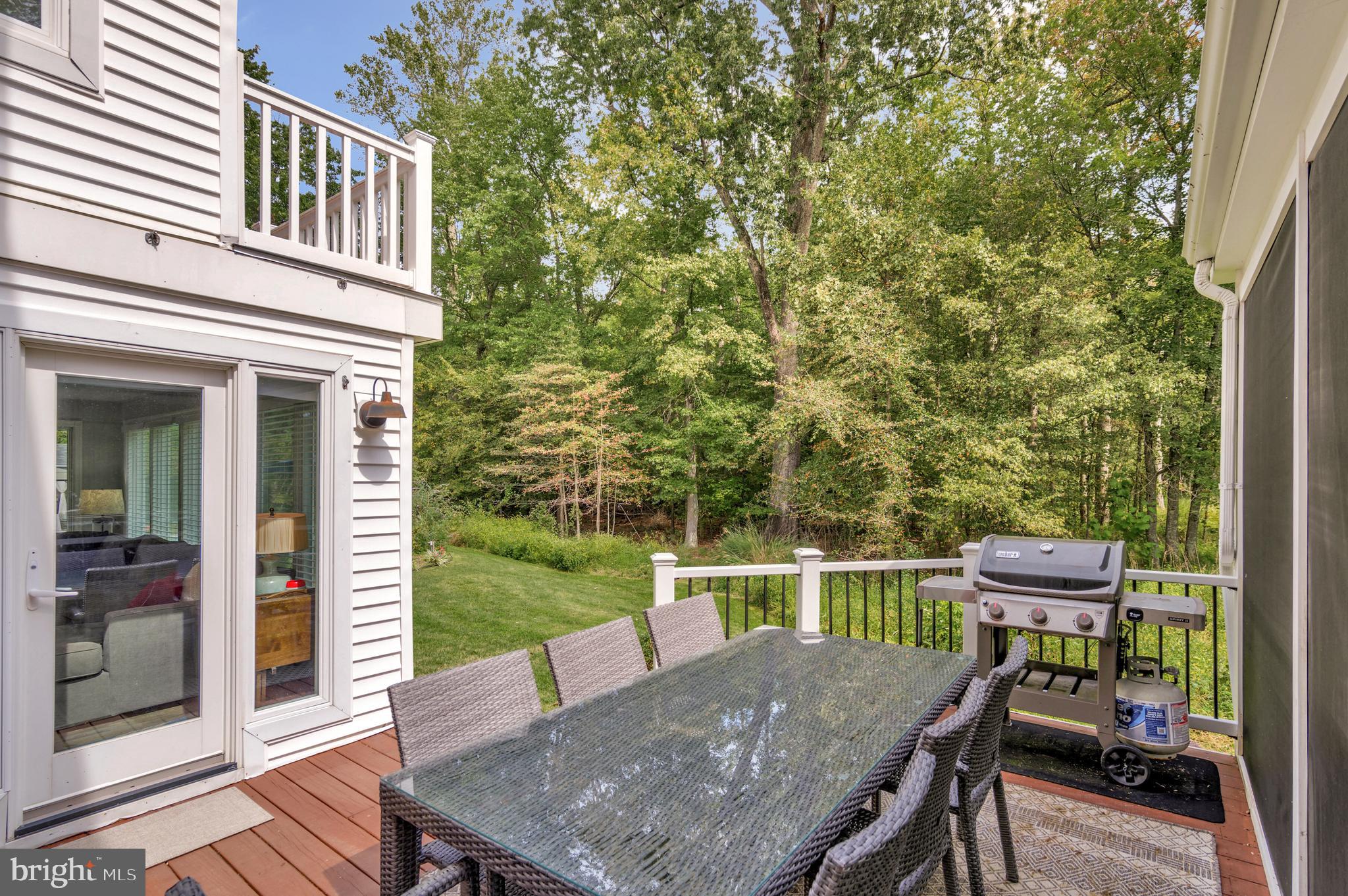 605 Barstow Road Prince Frederick, MD 20678 - Photo 11 of 57 a balcony with a table and chairs