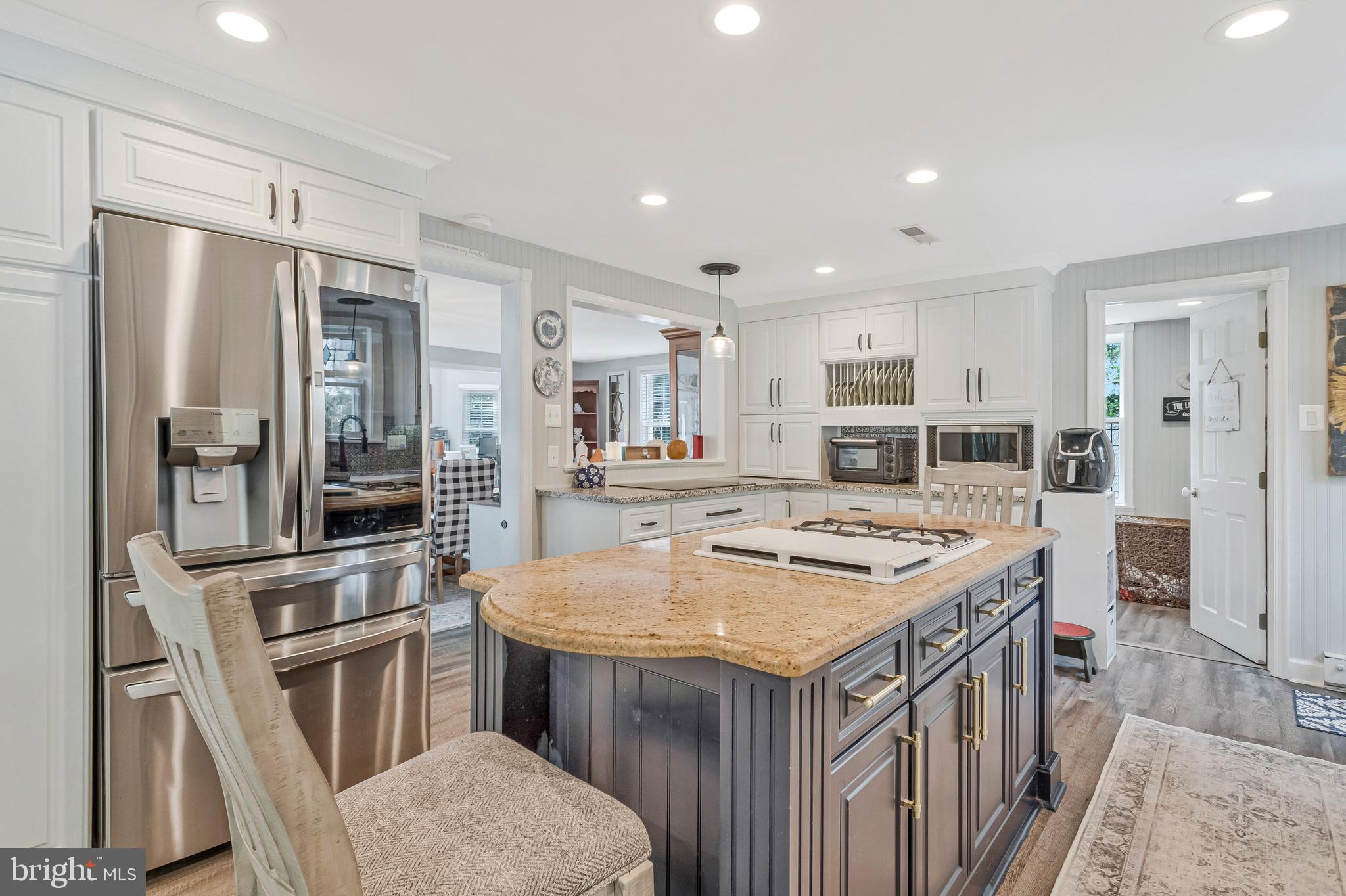 605 Barstow Road Prince Frederick, MD 20678 - Photo 18 of 57 a kitchen with a sink stove and refrigerator