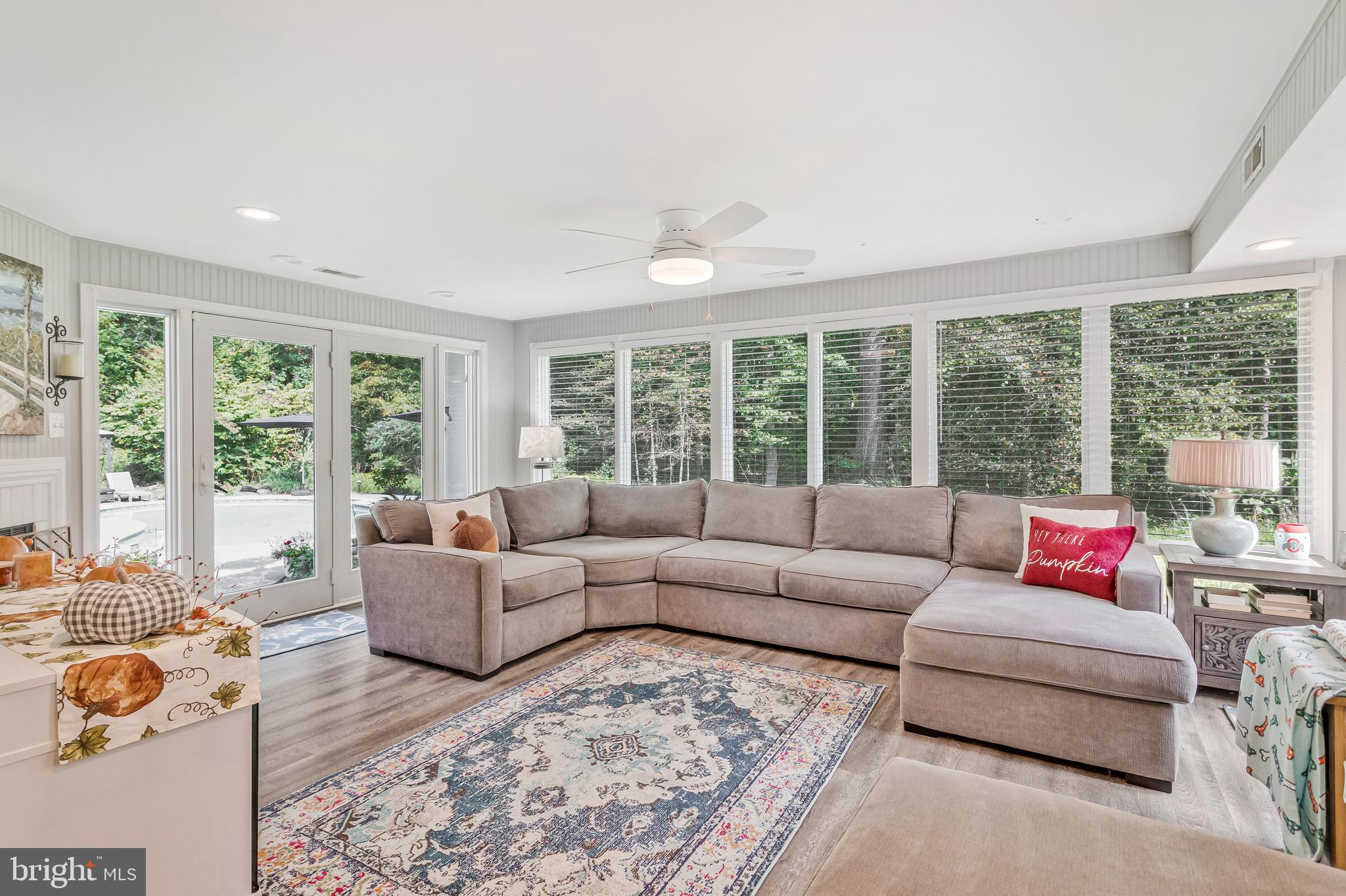 605 Barstow Road Prince Frederick, MD 20678 - Photo 21 of 57 a living room with furniture and large windows