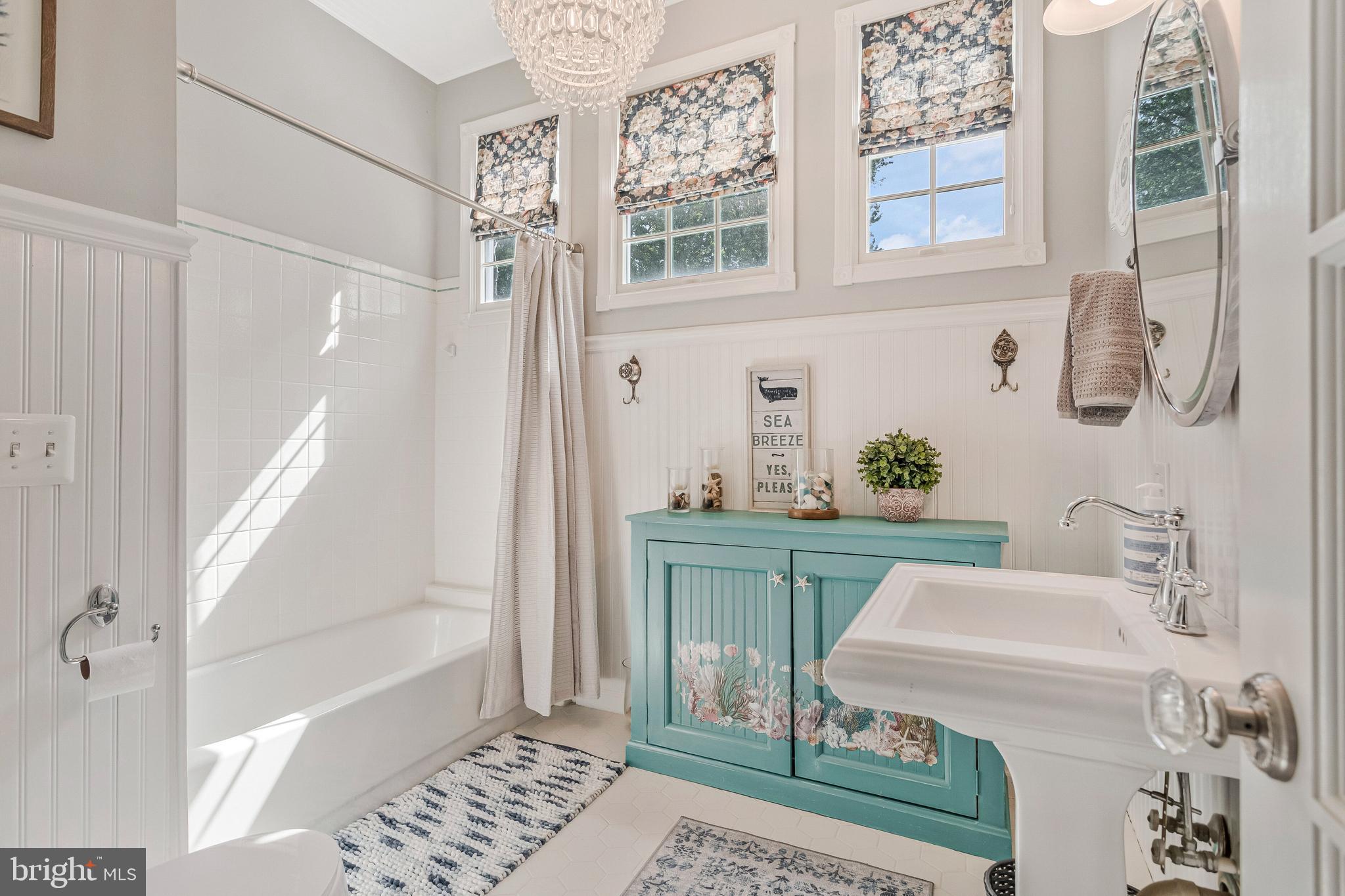 605 Barstow Road Prince Frederick, MD 20678 - Photo 25 of 57 a bathroom with a sink and a mirror
