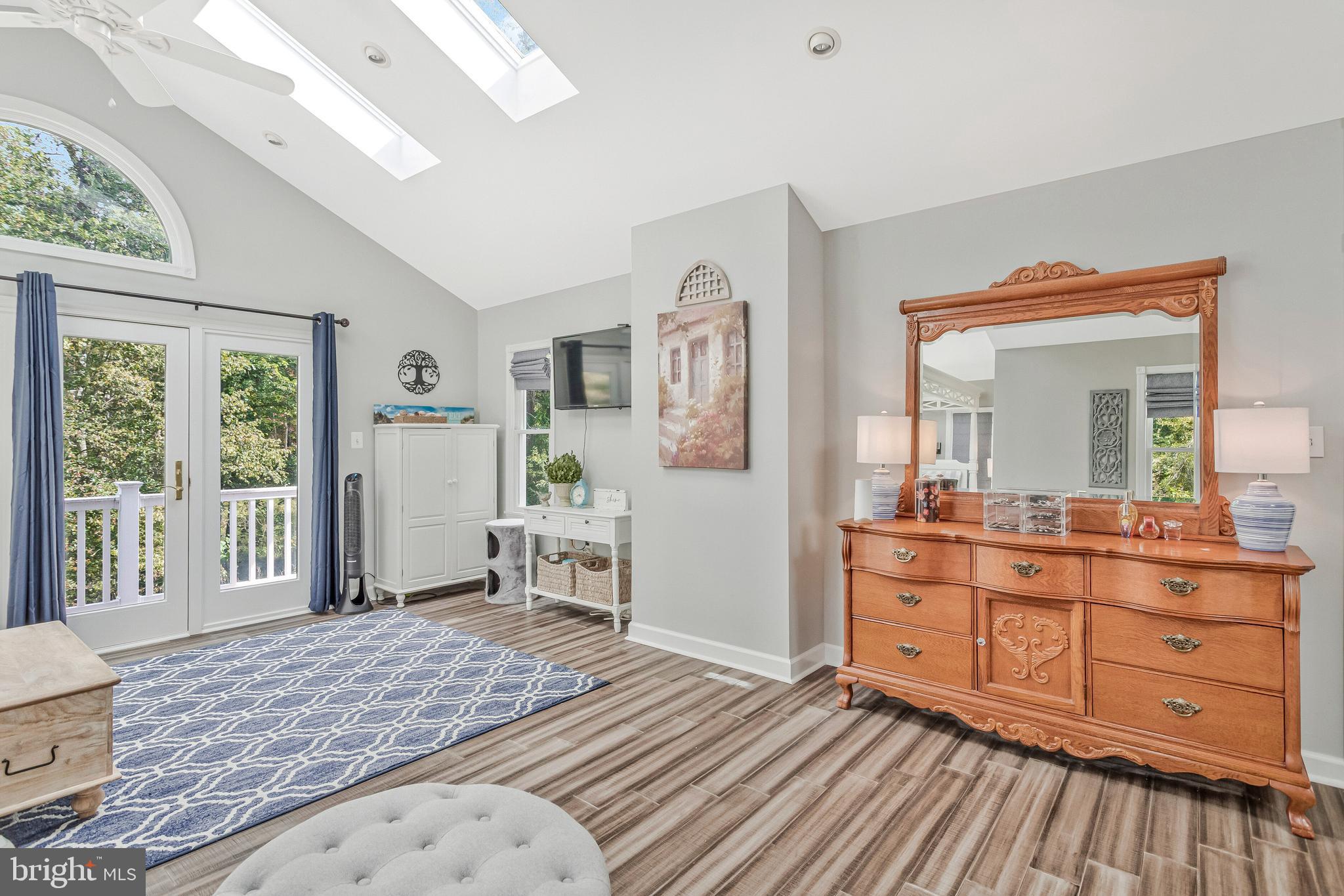 605 Barstow Road Prince Frederick, MD 20678 - Photo 28 of 57 a bedroom with a bed and a dresser in it
