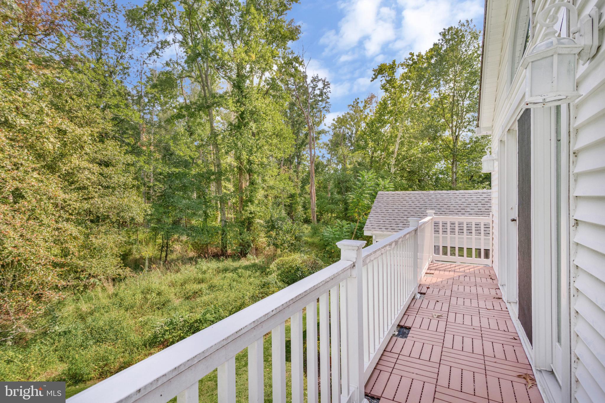 605 Barstow Road Prince Frederick, MD 20678 - Photo 31 of 57 a view of a balcony with wooden floor