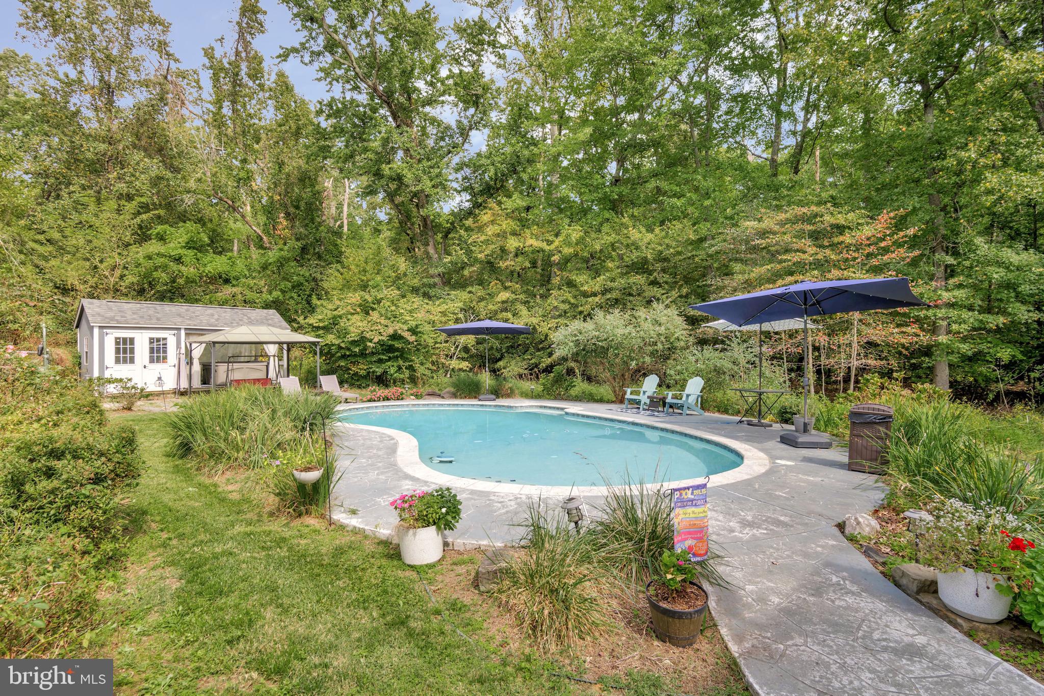 605 Barstow Road Prince Frederick, MD 20678 - Photo 33 of 57 a view of a backyard with potted plants