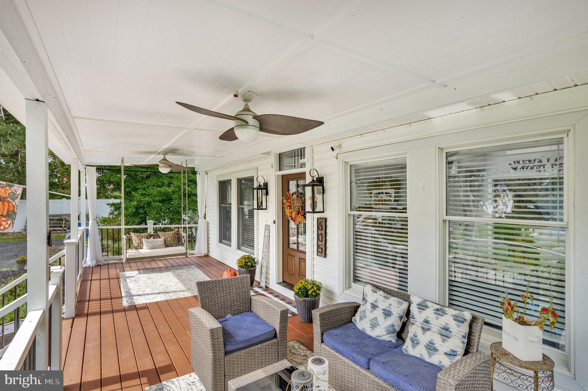 605 Barstow Road Prince Frederick, MD 20678 - Photo 4 of 57 a living room with furniture and a large window