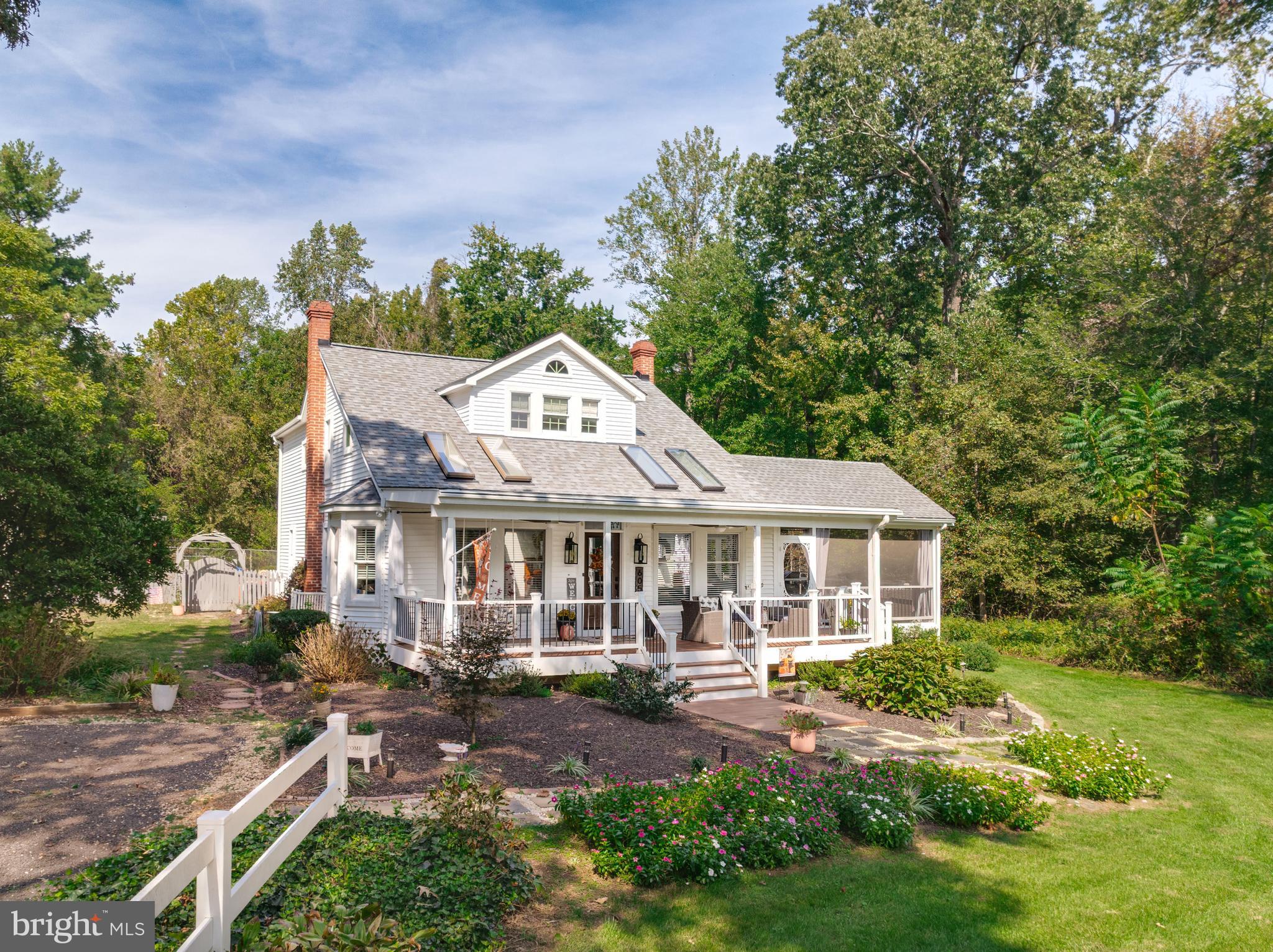 605 Barstow Road Prince Frederick, MD 20678 - Photo 44 of 57 an aerial view of a house with swimming pool and garden