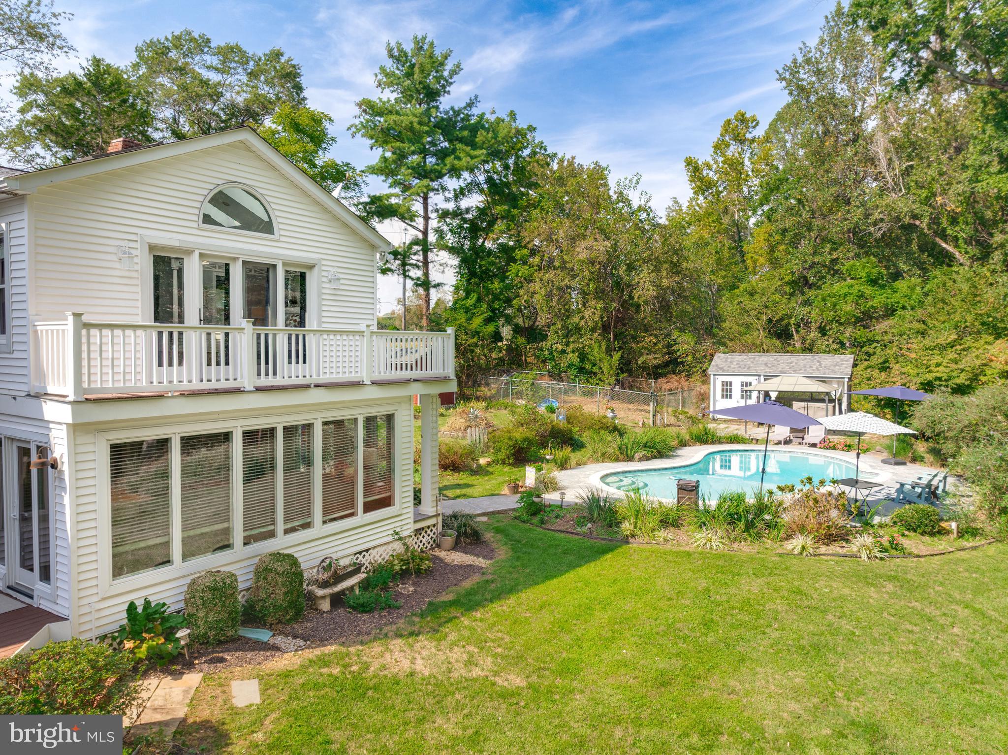 605 Barstow Road Prince Frederick, MD 20678 - Photo 45 of 57 a front view of a house with a yard