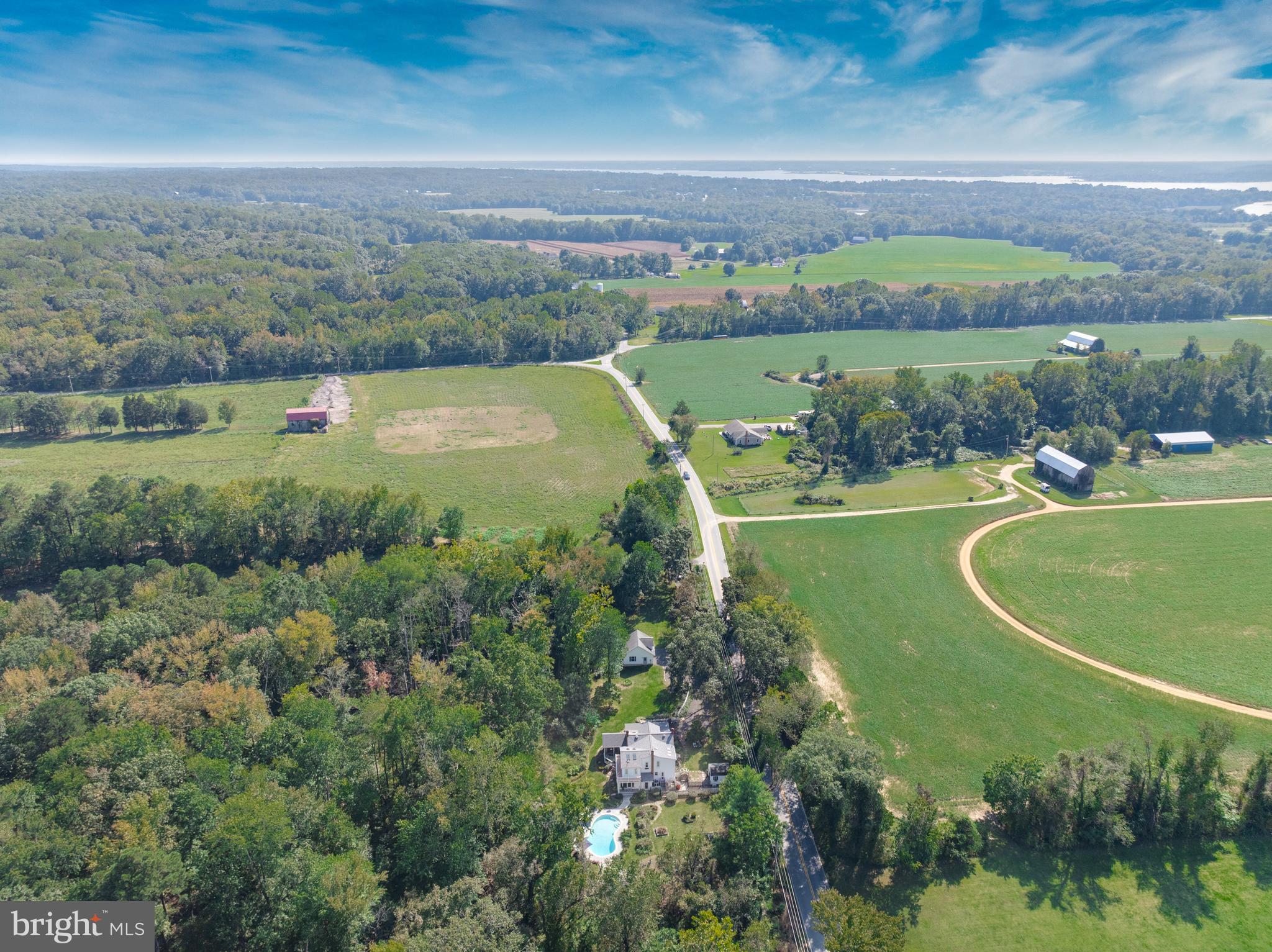 605 Barstow Road Prince Frederick, MD 20678 - Photo 54 of 57 a view of a lake with a yard
