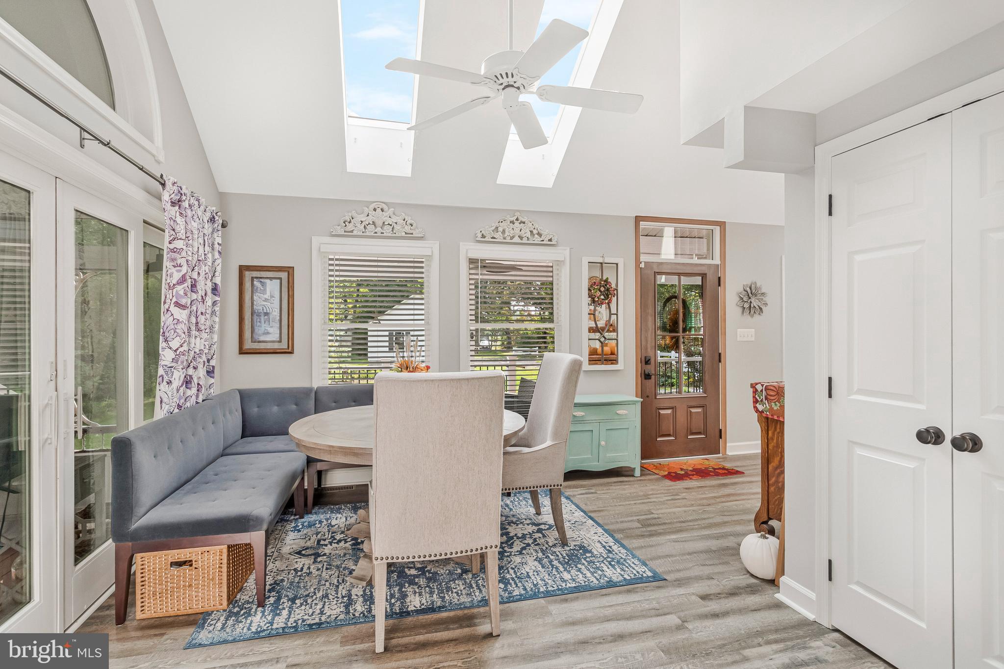 605 Barstow Road Prince Frederick, MD 20678 - Photo 6 of 57 a living room with furniture a table and chairs