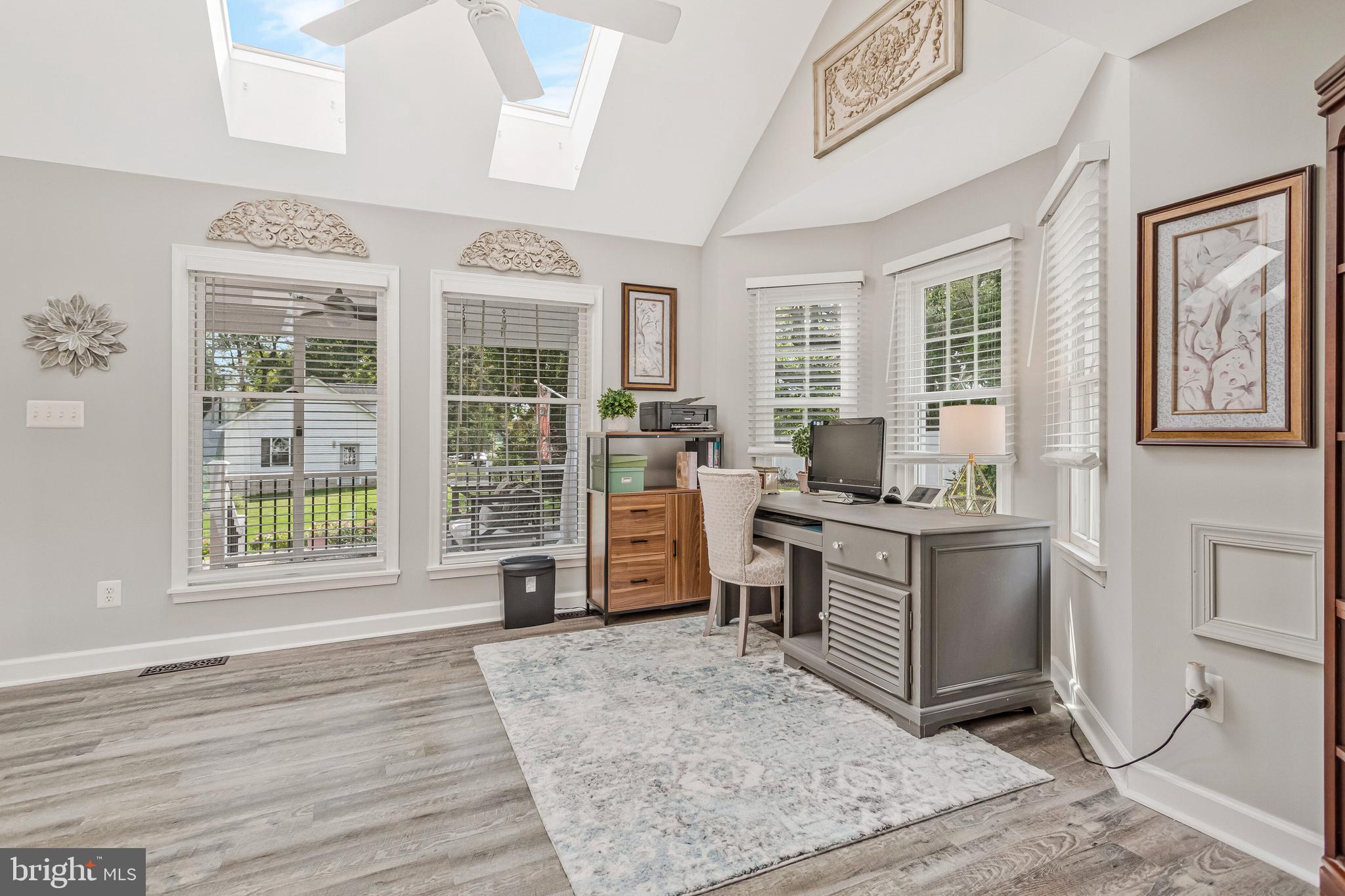 605 Barstow Road Prince Frederick, MD 20678 - Photo 8 of 57 a living room with furniture and large windows