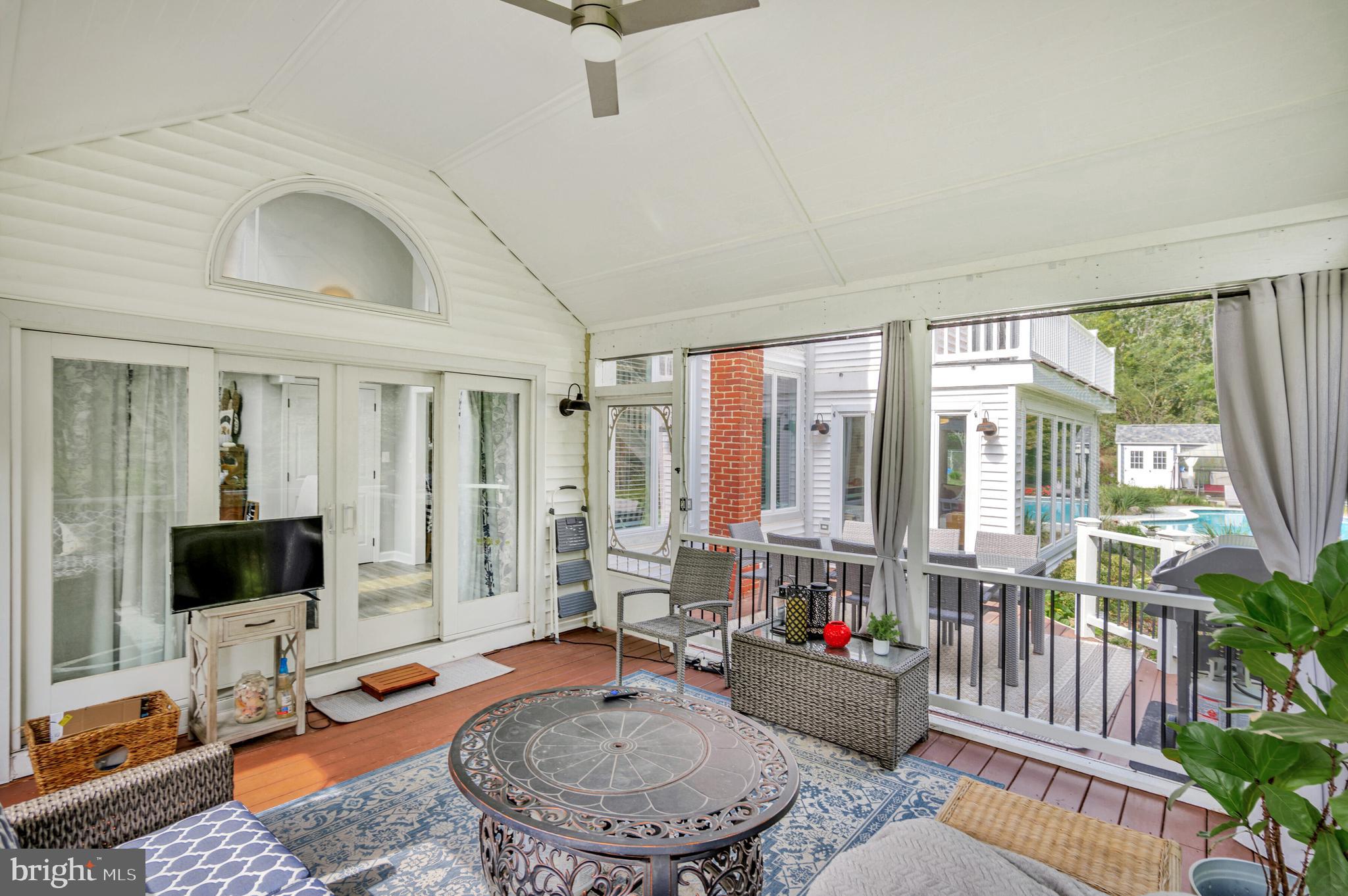 605 Barstow Road Prince Frederick, MD 20678 - Photo 10 of 57 a living room with furniture and a flat screen tv