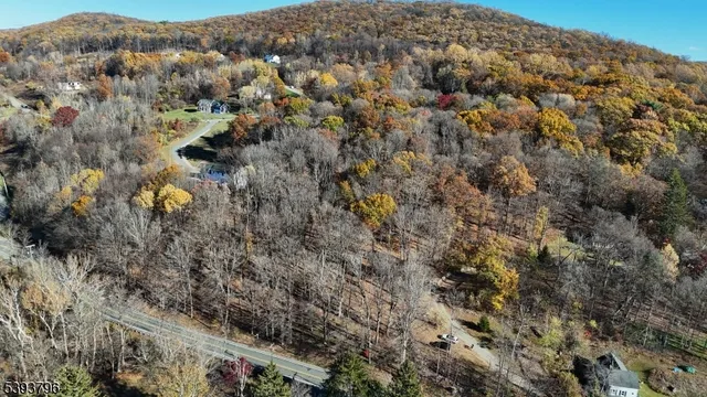 an aerial view of residential house with parking space