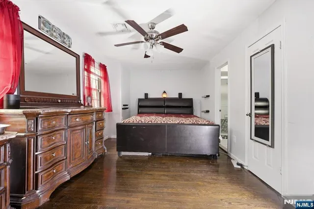 a living room with furniture and flat screen tv