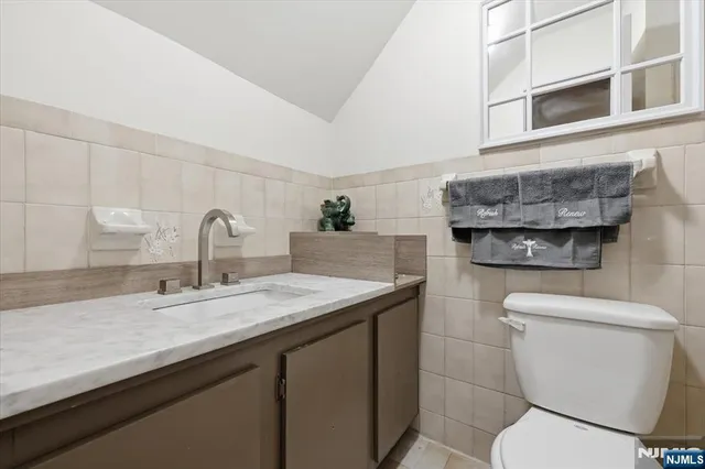 a bathroom with a sink and a toilet