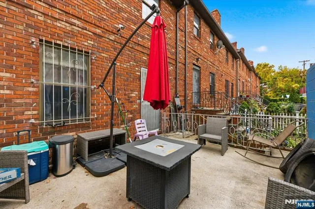 a building outdoor space with patio furniture