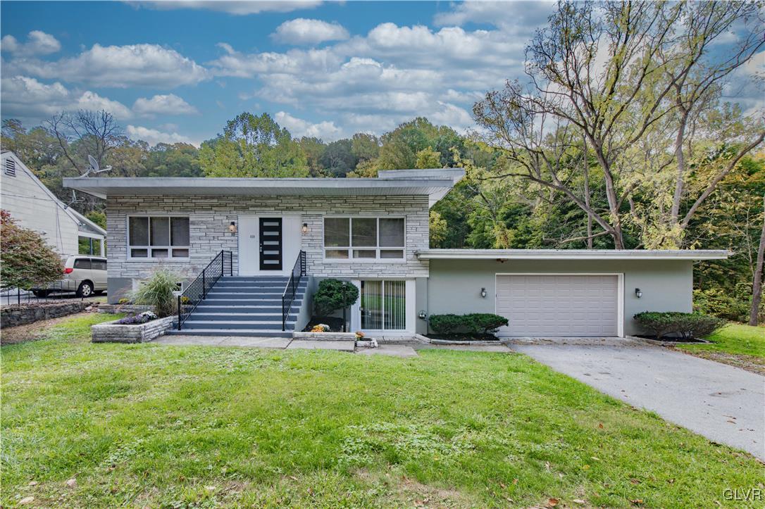 820 Morvale Road Easton, PA 18042 - Photo 1 of 50 a front view of house with yard and green space