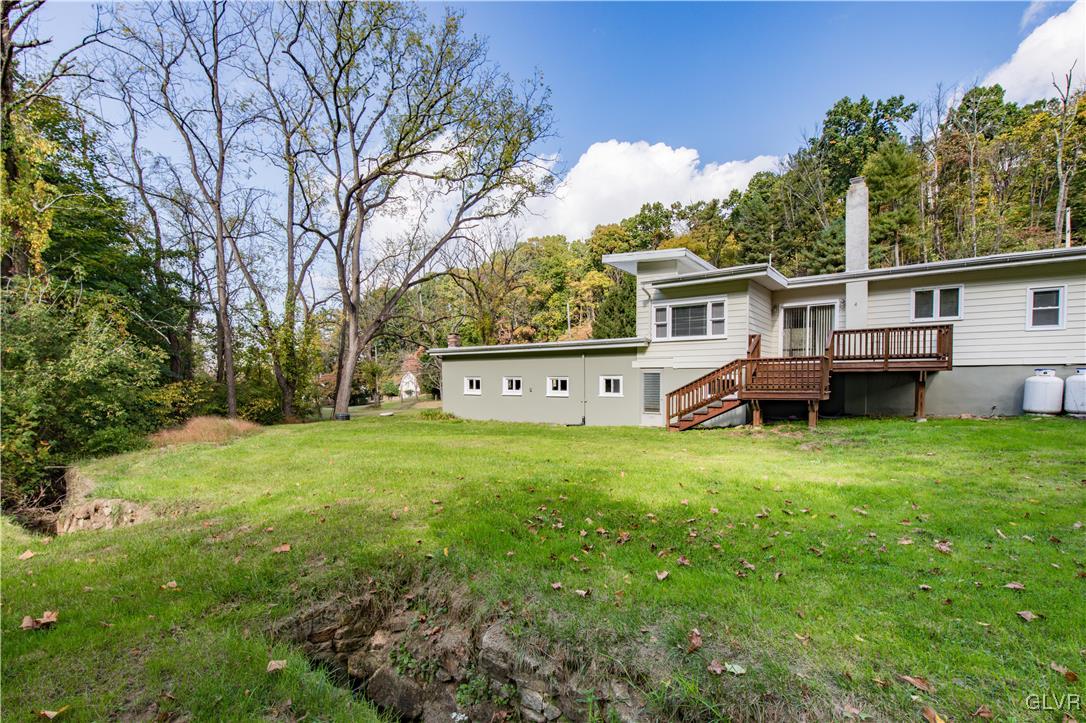 820 Morvale Road Easton, PA 18042 - Photo 11 of 50 a view of a house with backyard and garden