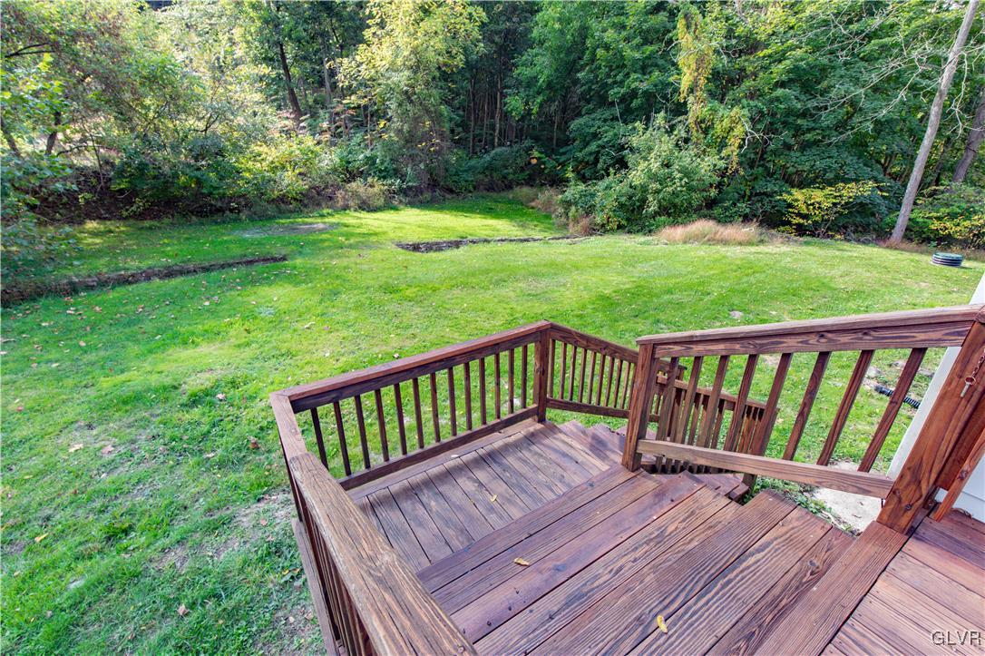 820 Morvale Road Easton, PA 18042 - Photo 15 of 50 a view of a deck with a chair