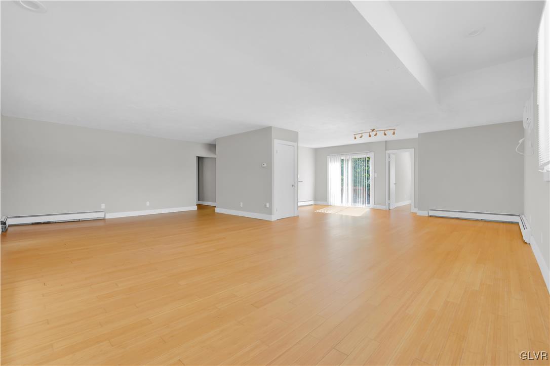 820 Morvale Road Easton, PA 18042 - Photo 18 of 50 a view of empty room with wooden floor