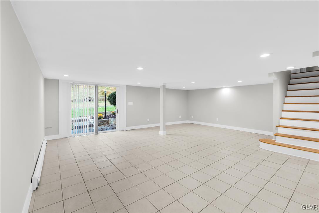 820 Morvale Road Easton, PA 18042 - Photo 36 of 50 an empty room with windows and chairs