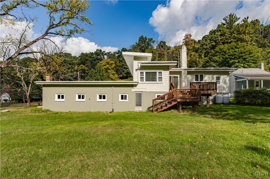 820 Morvale Road Easton, PA 18042 - Photo 9 of 50 a view of a house with backyard sitting area and garden