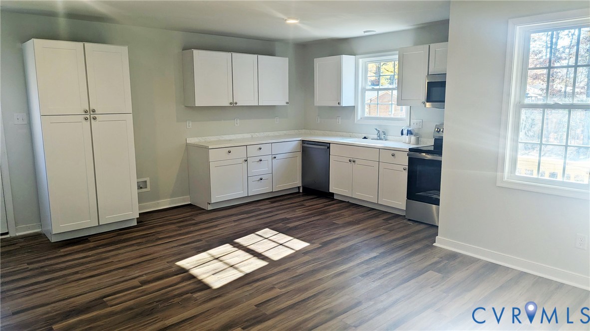 3008 Plumtree Street Colonial Heights, VA 23834 - Photo 7 of 11 Kitchen featuring white cabinets, appliances with