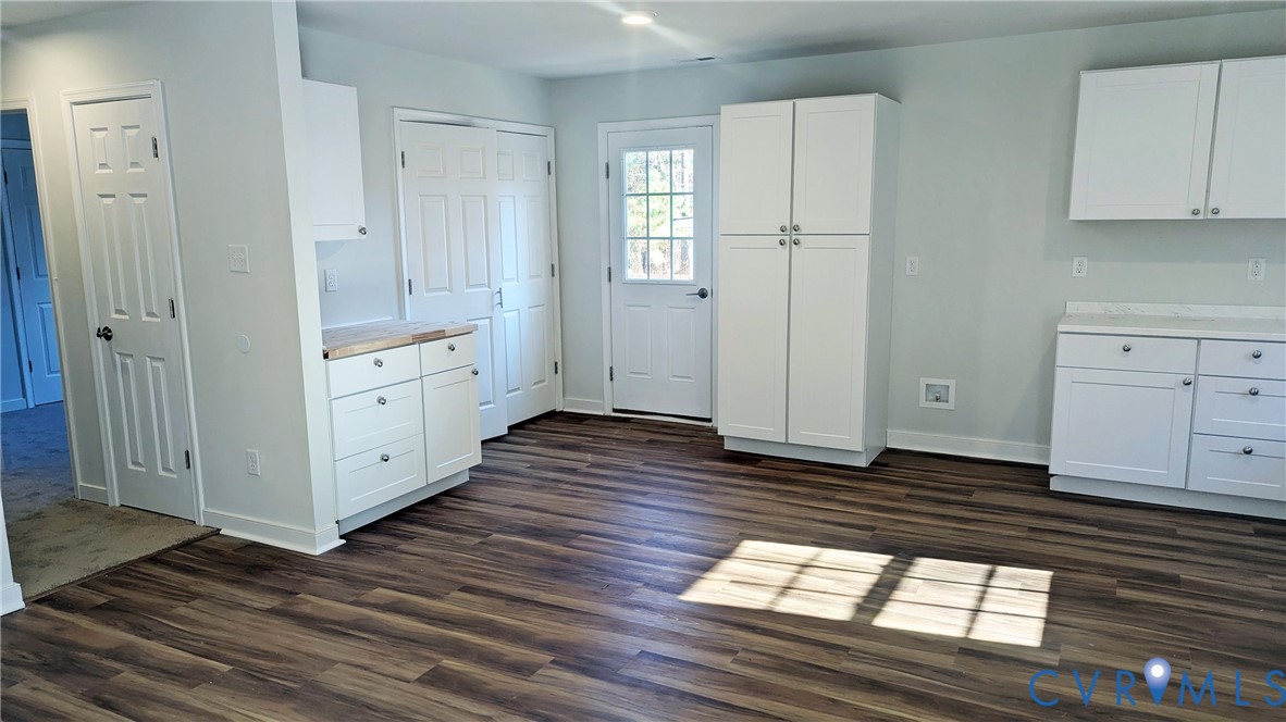 3008 Plumtree Street Colonial Heights, VA 23834 - Photo 8 of 11 Kitchen with white cabinetry, light countertops, d