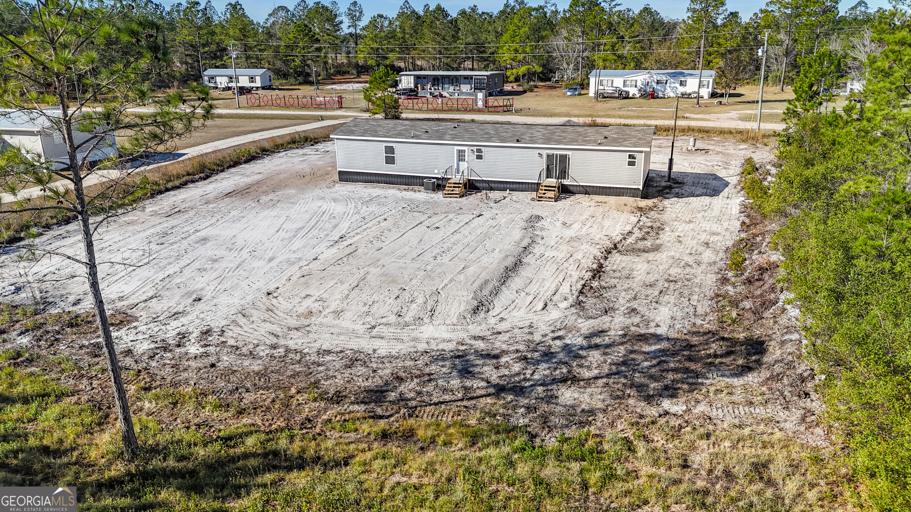 123 Daniel Street Waynesville, GA 31566 - Photo 34 of 36 a view of swimming pool with seating space