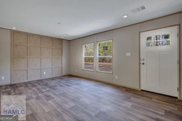 an empty room with windows