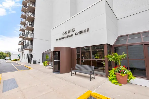 a front view of multi story residential apartment building