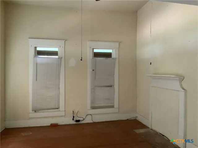 an empty room with a door