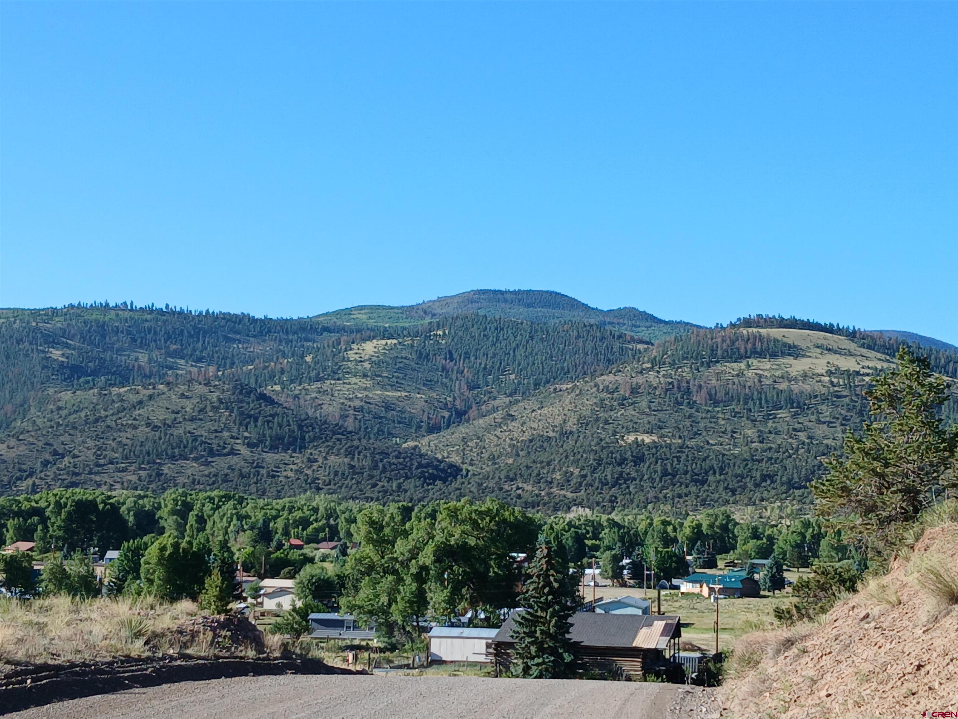 555 Aspen Road South Fork, CO 81154 - Photo 13 of 15 a view of a road with a outdoor space