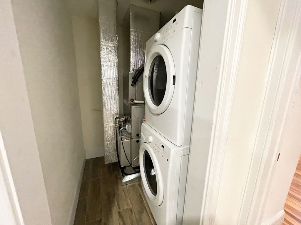 31 Edison Green, Unit 2 Boston, MA 02125 - Photo 14 of 16 a utility room with dryer and washer