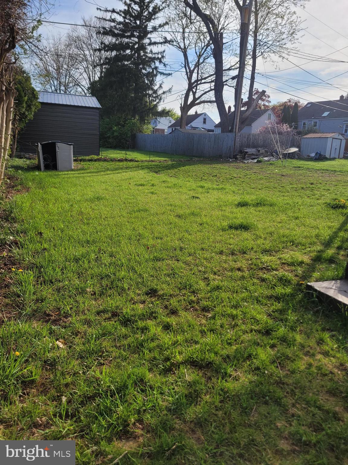 1217 Sheridan Street Reading, PA 19611 - Photo 3 of 38 a backyard of a house with lots of green space