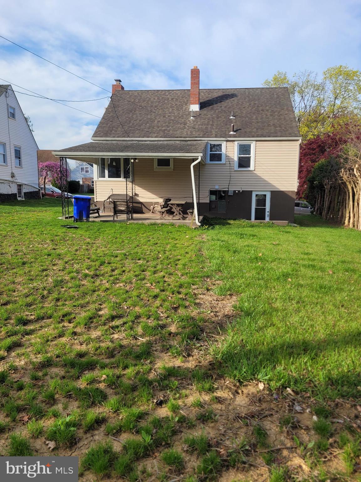 1217 Sheridan Street Reading, PA 19611 - Photo 5 of 38 a front view of a house with a garden