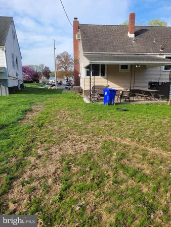 a front view of house with yard