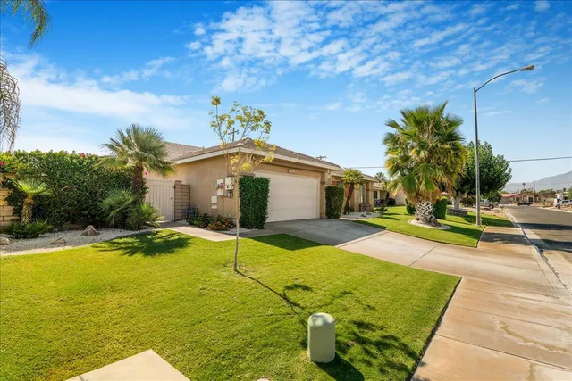 a view of a house with swimming pool