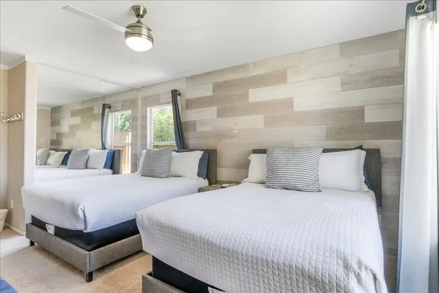 a bedroom with a bed and a cabinets