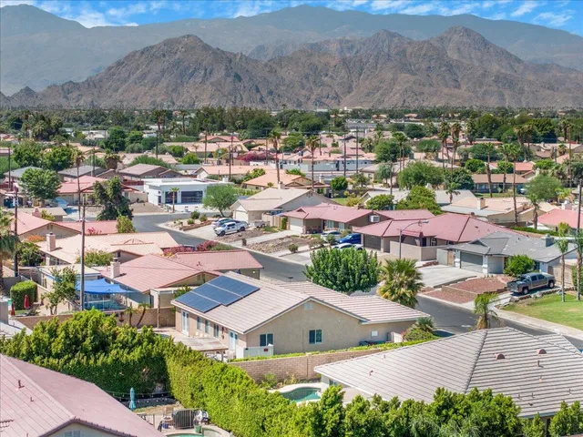 a view of multiple houses with a outdoor space