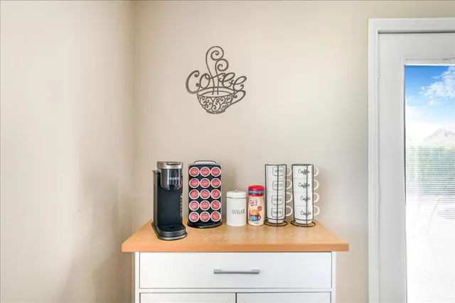 a bathroom with a mirror and a shelf