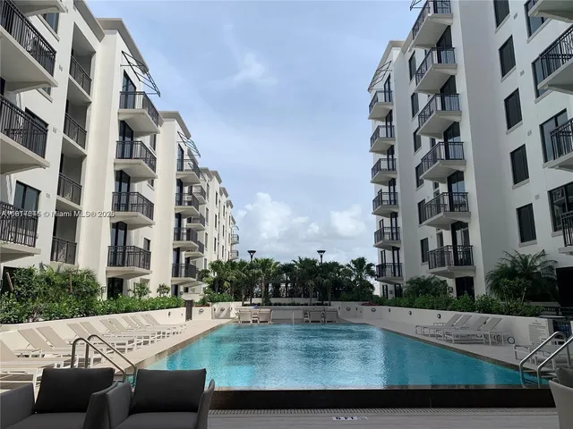 a view of a swimming pool with a chair