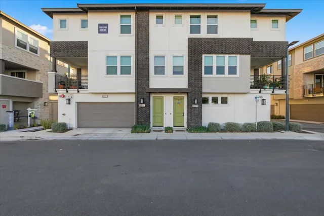 a front view of a building with a street