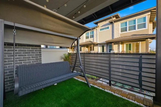 a view of front door and small yard