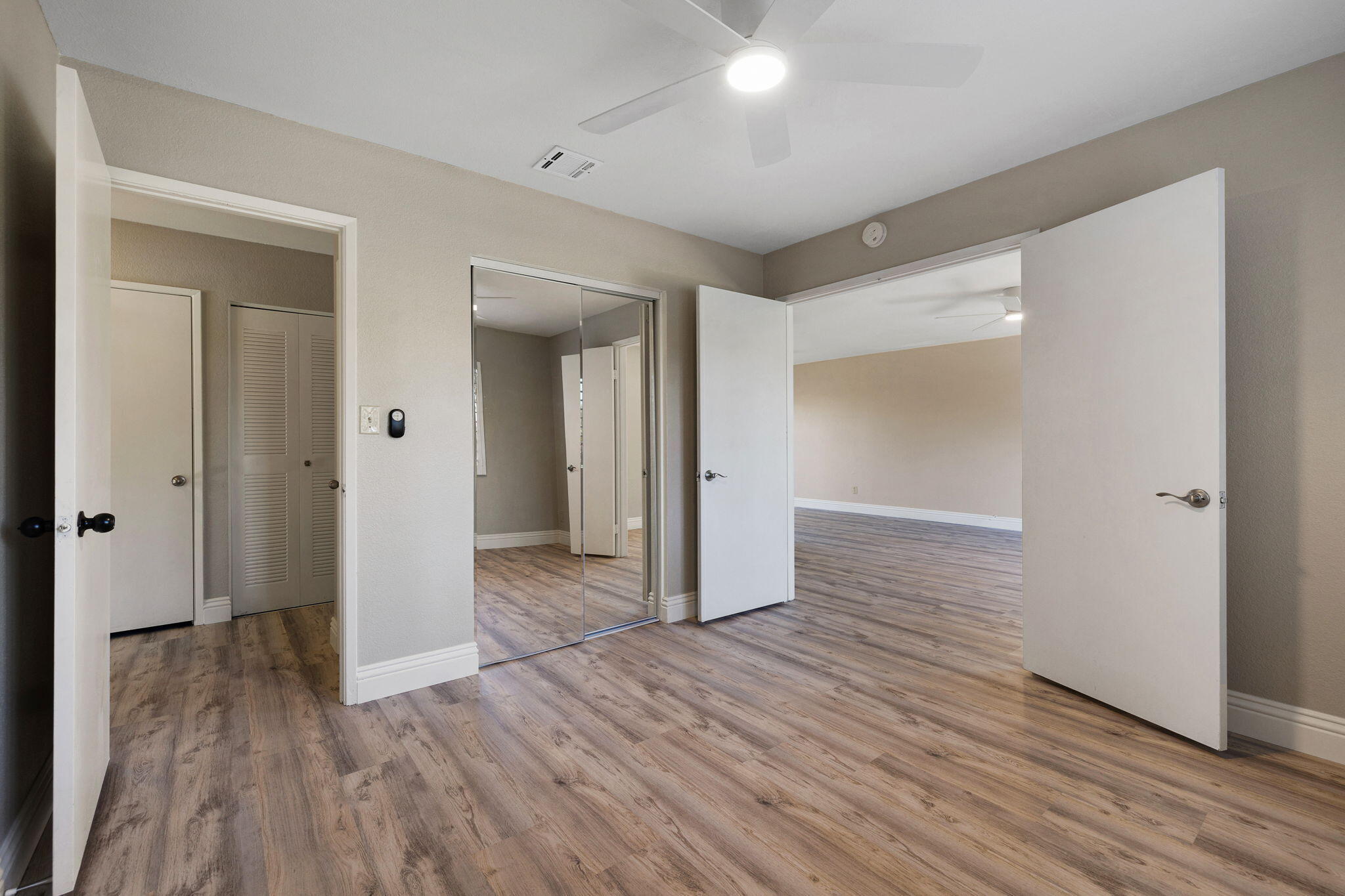 41045 Largo Palm Desert, CA 92211 - Photo 23 of 46 a view of hallway with wooden floor