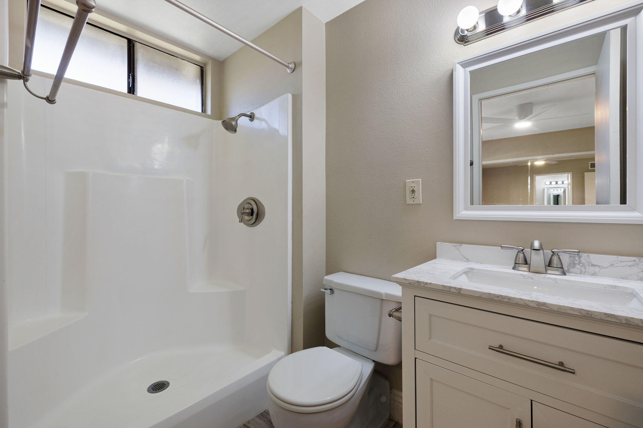 41045 Largo Palm Desert, CA 92211 - Photo 26 of 46 a bathroom with a sink a toilet and shower